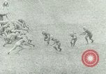 Image "Grange rouge" jouent au football pour l'Université de l'Illinois Philadelphia Pennsylvania United States USA, 1925, de la seconde 11 séquences d'archives historiques vidéo 65675065245