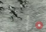 Image "Grange rouge" jouent au football pour l'Université de l'Illinois Philadelphia Pennsylvania United States USA, 1925, de la seconde 19 séquences d'archives historiques vidéo 65675065245