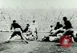 Image "Grange rouge" jouent au football pour l'Université de l'Illinois Philadelphia Pennsylvania United States USA, 1925, de la seconde 35 séquences d'archives historiques vidéo 65675065245