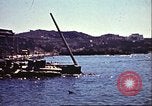 Immagine di Danneggiato le barche e gli edifici sulla costa nella seconda guerra mondiale Il Nord Africa, 1942, secondo 5 filmato di repertorio 65675065261