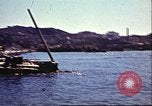 Immagine di Danneggiato le barche e gli edifici sulla costa nella seconda guerra mondiale Il Nord Africa, 1942, secondo 6 filmato di repertorio 65675065261