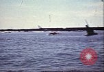 Immagine di Danneggiato le barche e gli edifici sulla costa nella seconda guerra mondiale Il Nord Africa, 1942, secondo 17 filmato di repertorio 65675065261