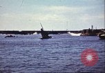 Immagine di Danneggiato le barche e gli edifici sulla costa nella seconda guerra mondiale Il Nord Africa, 1942, secondo 19 filmato di repertorio 65675065261