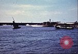 Immagine di Danneggiato le barche e gli edifici sulla costa nella seconda guerra mondiale Il Nord Africa, 1942, secondo 20 filmato di repertorio 65675065261