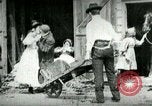Image of husking bee West Orange New Jersey USA, 1898, second 16 stock footage video 65675065287
