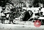 Image of Man chopping wood United States USA, 1898, second 19 stock footage video 65675065304