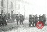 Image of U.S. troops raise flag on radio tower celebrating Armistice France, 1918, second 1 stock footage video 65675065322