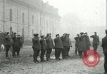 Image of U.S. troops raise flag on radio tower celebrating Armistice France, 1918, second 4 stock footage video 65675065322