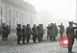 Image of U.S. troops raise flag on radio tower celebrating Armistice France, 1918, second 5 stock footage video 65675065322