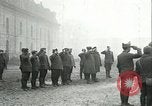 Image of U.S. troops raise flag on radio tower celebrating Armistice France, 1918, second 6 stock footage video 65675065322