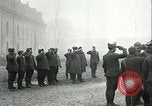 Image of U.S. troops raise flag on radio tower celebrating Armistice France, 1918, second 7 stock footage video 65675065322
