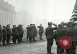 Image of U.S. troops raise flag on radio tower celebrating Armistice France, 1918, second 8 stock footage video 65675065322