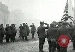Image of U.S. troops raise flag on radio tower celebrating Armistice France, 1918, second 9 stock footage video 65675065322