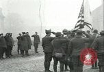 Image of U.S. troops raise flag on radio tower celebrating Armistice France, 1918, second 10 stock footage video 65675065322