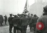 Image of U.S. troops raise flag on radio tower celebrating Armistice France, 1918, second 13 stock footage video 65675065322