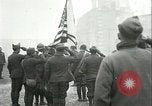 Image of U.S. troops raise flag on radio tower celebrating Armistice France, 1918, second 15 stock footage video 65675065322