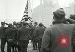 Image of U.S. troops raise flag on radio tower celebrating Armistice France, 1918, second 17 stock footage video 65675065322