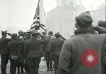 Image of U.S. troops raise flag on radio tower celebrating Armistice France, 1918, second 18 stock footage video 65675065322
