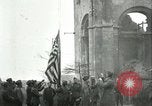 Image of U.S. troops raise flag on radio tower celebrating Armistice France, 1918, second 23 stock footage video 65675065322