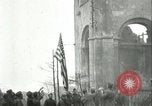 Image of U.S. troops raise flag on radio tower celebrating Armistice France, 1918, second 24 stock footage video 65675065322