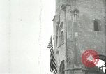 Image of U.S. troops raise flag on radio tower celebrating Armistice France, 1918, second 31 stock footage video 65675065322