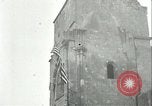 Image of U.S. troops raise flag on radio tower celebrating Armistice France, 1918, second 37 stock footage video 65675065322