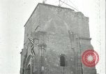 Image of U.S. troops raise flag on radio tower celebrating Armistice France, 1918, second 40 stock footage video 65675065322