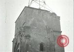 Image of U.S. troops raise flag on radio tower celebrating Armistice France, 1918, second 41 stock footage video 65675065322