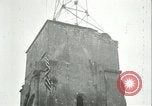Image of U.S. troops raise flag on radio tower celebrating Armistice France, 1918, second 42 stock footage video 65675065322