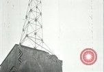 Image of U.S. troops raise flag on radio tower celebrating Armistice France, 1918, second 48 stock footage video 65675065322