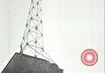 Image of U.S. troops raise flag on radio tower celebrating Armistice France, 1918, second 50 stock footage video 65675065322