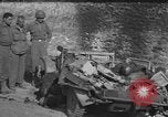 Image of burned bodies France, 1944, second 9 stock footage video 65675065390