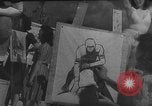 Image Les modèles posent pour les artistes sur une plage de Floride Florida USA, 1941, de la seconde 9 séquences d'archives historiques vidéo 65675065469