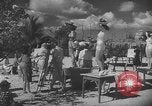 Image Les modèles posent pour les artistes sur une plage de Floride Florida USA, 1941, de la seconde 22 séquences d'archives historiques vidéo 65675065469