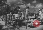 Image Les modèles posent pour les artistes sur une plage de Floride Florida USA, 1941, de la seconde 23 séquences d'archives historiques vidéo 65675065469