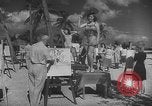Image Les modèles posent pour les artistes sur une plage de Floride Florida USA, 1941, de la seconde 24 séquences d'archives historiques vidéo 65675065469