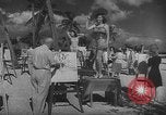 Image Les modèles posent pour les artistes sur une plage de Floride Florida USA, 1941, de la seconde 26 séquences d'archives historiques vidéo 65675065469