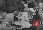 Image Les modèles posent pour les artistes sur une plage de Floride Florida USA, 1941, de la seconde 27 séquences d'archives historiques vidéo 65675065469