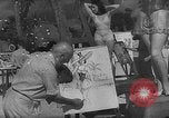 Image Les modèles posent pour les artistes sur une plage de Floride Florida USA, 1941, de la seconde 28 séquences d'archives historiques vidéo 65675065469