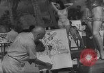 Image Les modèles posent pour les artistes sur une plage de Floride Florida USA, 1941, de la seconde 29 séquences d'archives historiques vidéo 65675065469