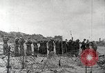 Immagine di Scene di Omaha Beach dopo essendo fissato nella seconda guerra mondiale Normandia Francia, 1944, secondo 7 filmato di repertorio 65675065483
