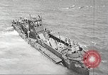 Immagine di Scene di Omaha Beach dopo essendo fissato nella seconda guerra mondiale Normandia Francia, 1944, secondo 62 filmato di repertorio 65675065483