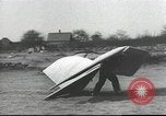 Image of ornithopter man with cardboard wings tries to fly United States USA, 1939, second 4 stock footage video 65675065522