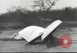 Image of ornithopter man with cardboard wings tries to fly United States USA, 1939, second 6 stock footage video 65675065522