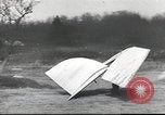 Image of ornithopter man with cardboard wings tries to fly United States USA, 1939, second 7 stock footage video 65675065522