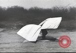 Image of ornithopter man with cardboard wings tries to fly United States USA, 1939, second 8 stock footage video 65675065522