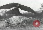 Image of ornithopter man with cardboard wings tries to fly United States USA, 1939, second 11 stock footage video 65675065522