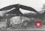 Image of ornithopter man with cardboard wings tries to fly United States USA, 1939, second 12 stock footage video 65675065522