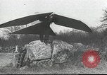 Image of ornithopter man with cardboard wings tries to fly United States USA, 1939, second 14 stock footage video 65675065522