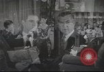 Image of U.S. Airman guest in British home United Kingdom, 1953, second 1 stock footage video 65675065566